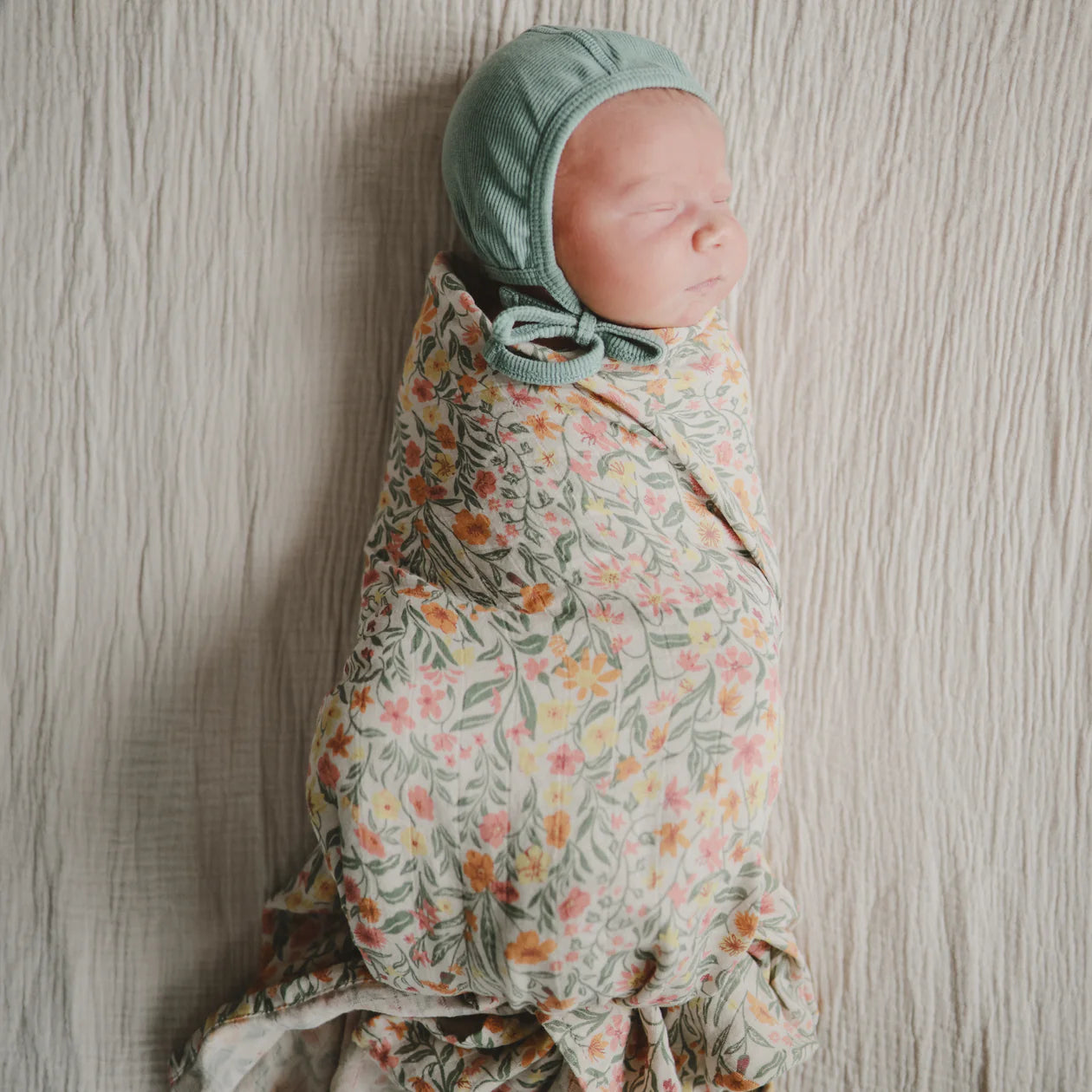 Mushie Organic Swaddle Blanket | Pastel Blooms